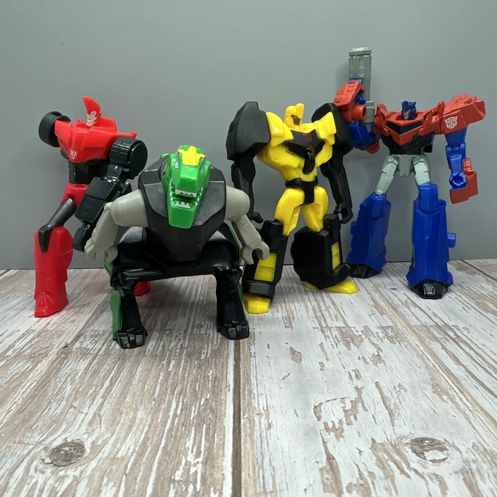 Transformers McDonald's Toy Lot of 4 NICE Dino Optimus Prime Action Figures